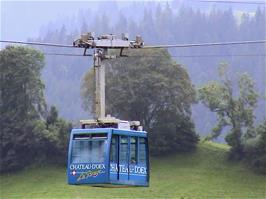 The Château d'Oex cable car heads for the mountains, as seen from the Co-op car park